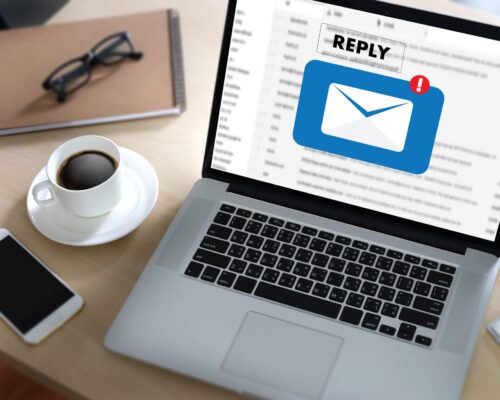 reply the message email on computer Businessman is working to important reminder
